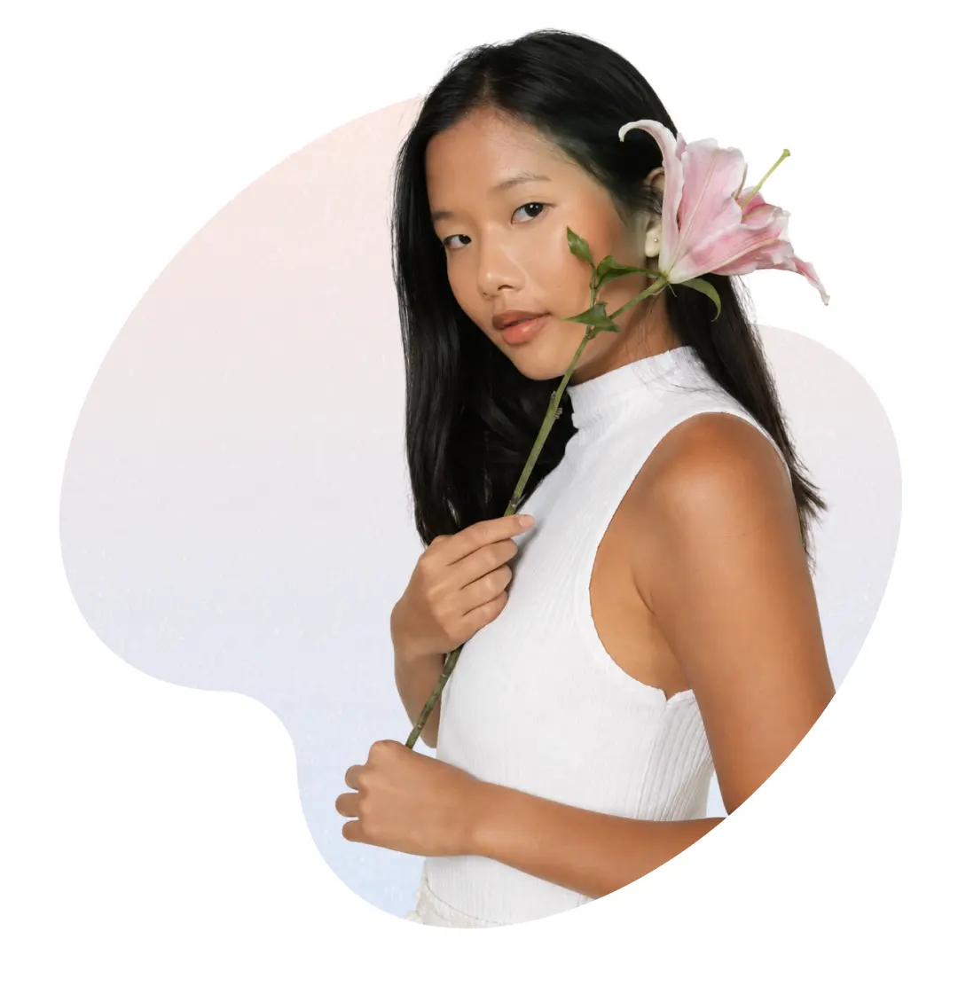 A patient holding a flower