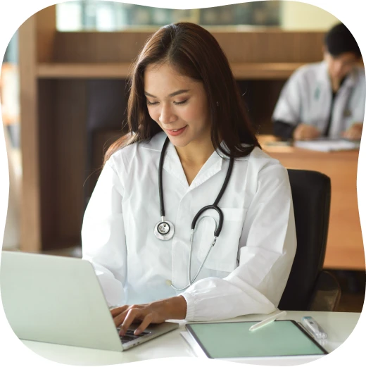 Doctor working remotely on a laptop